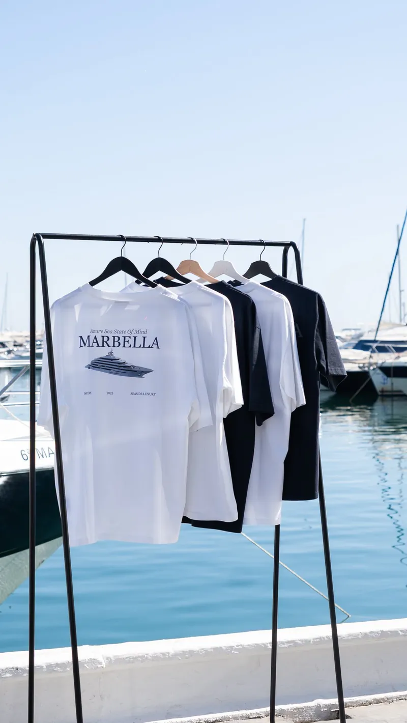 The Yacht tees on a rail in the marina